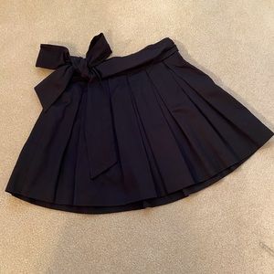 Black knee length full skirt with sash